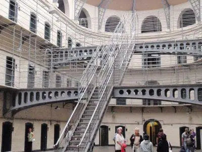 Intimate prison tour group exploring Kilmainham Gaol with expert historical guide